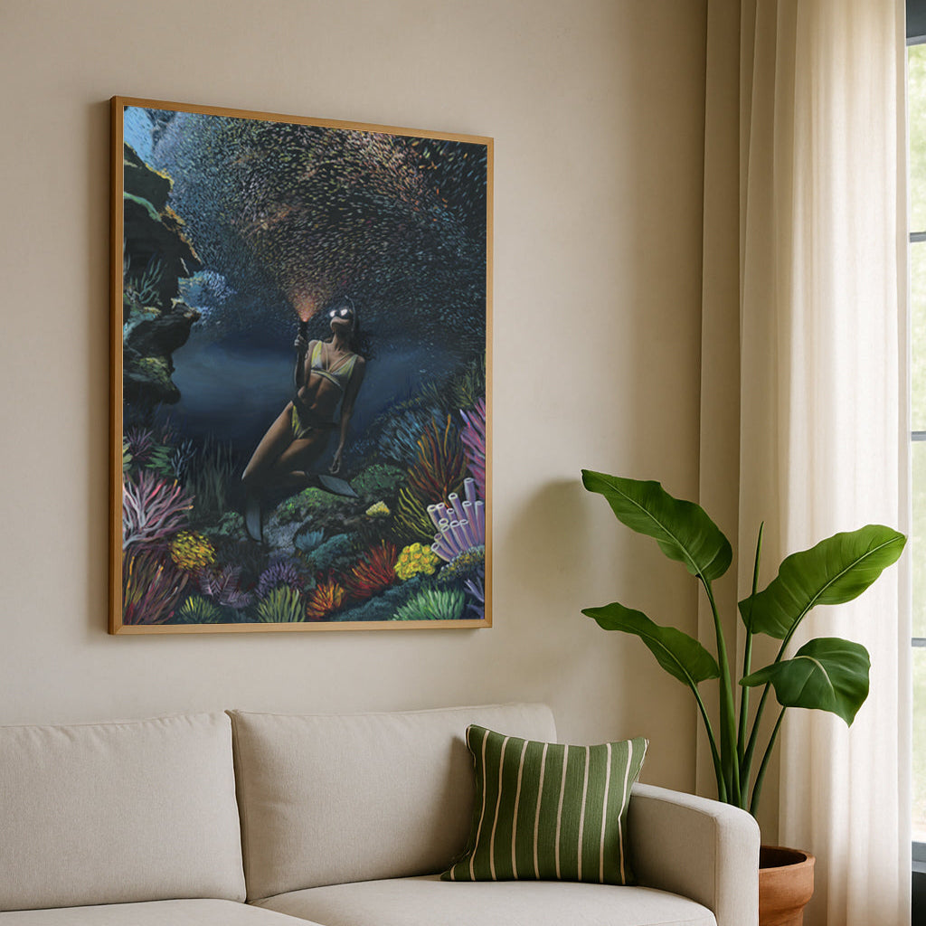 Underwater diver surrounded by coral and fish — collaboration by Carlos V. Garcia and Dan Legend, Cayman Islands.